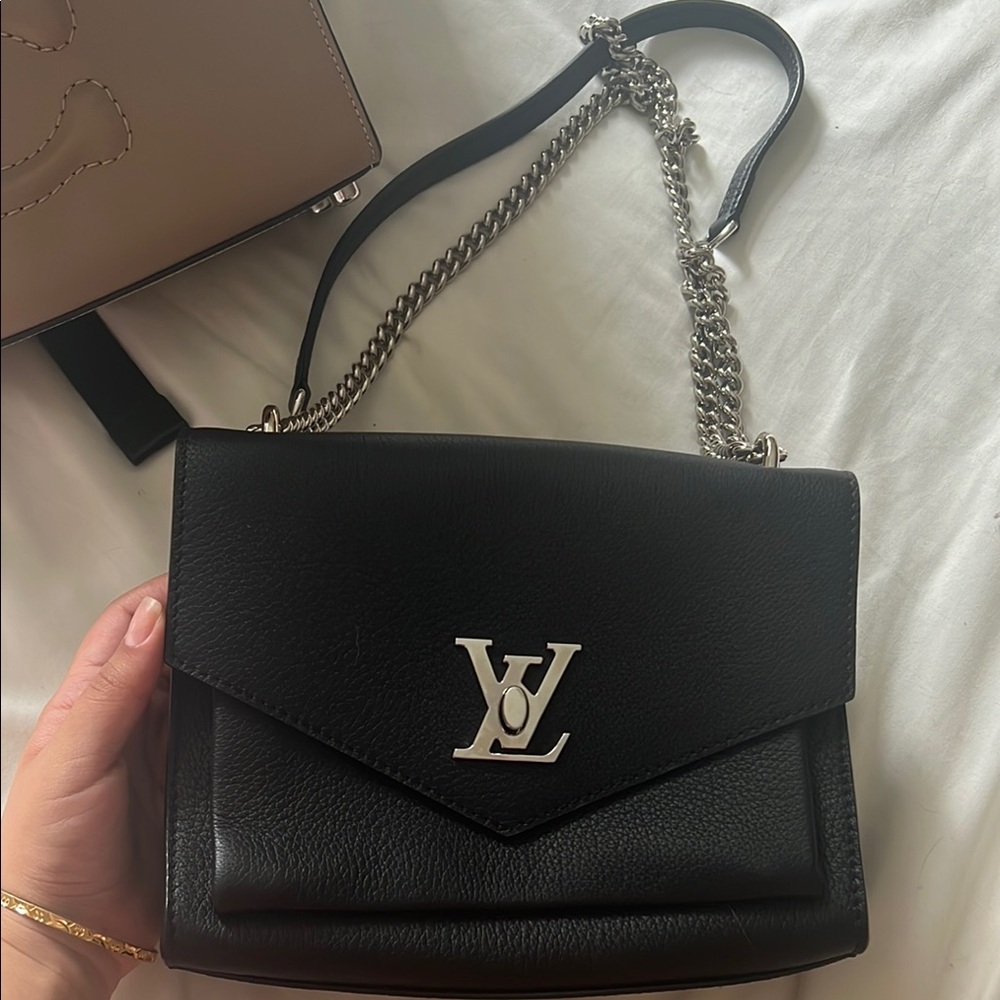 Louis Vuitton Black and Silver Crossbody Bag with Sleek Design